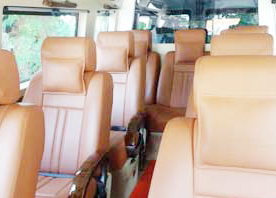 9 seater deluxe 1x1 tempo traveller